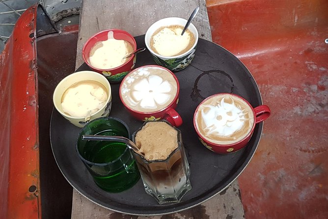 Hanoi Michelin Star Walking Food Tour & Train Street - Bach Ma Temple and the first Old Quarter turns
