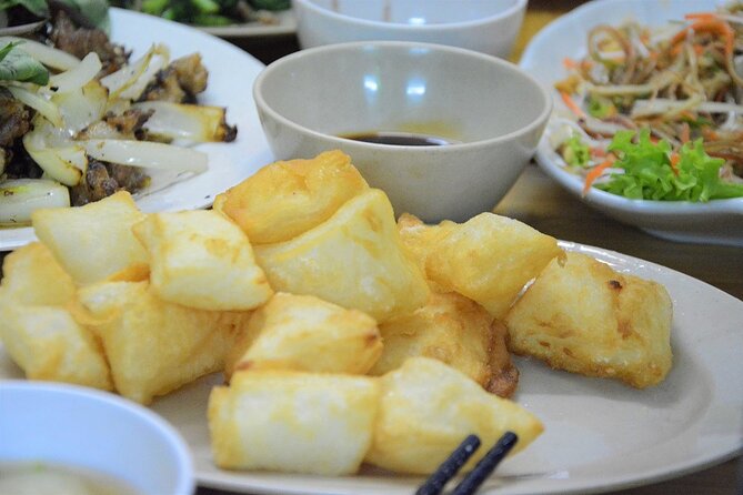 Hanoi Motorbike Tour Led By Women - City And Countryside Full Day - Co Loa Citadel, a wet market, and Lotus Lake
