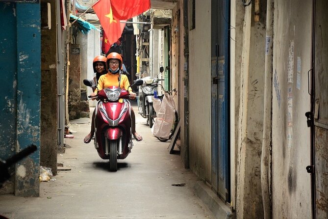 Hanoi Motorbike Tours Led By Women: Hanoi City Insight Motorbike Tours - Huu Tiep Lake and the downed B-52