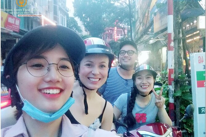 Hanoi old quarter sightseeing & street food eating by Motorcycle - Six to eight stops, ten Hanoi specialties