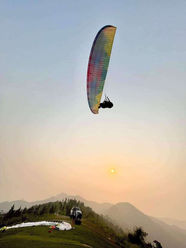 Hanoi Sky Tour: Paragliding - Mountain views, clouds, and the GoPro camera