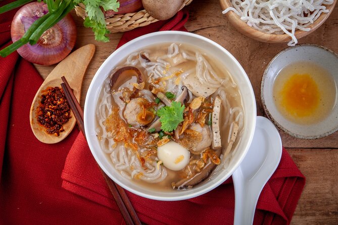 Hanoi Street Eats Evening Small Group Tour - Hang Ma Street and the egg coffee stop
