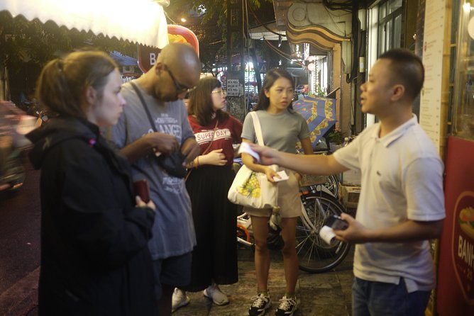 Hanoi street food tour small group tour - Grilled fish, roll cake, and dried beef salad