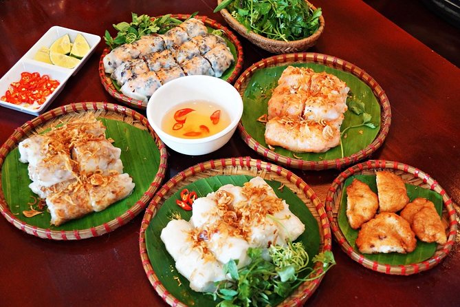 Hanoi Street Food Walking Tour By Night - What the seven food and drink stops may include