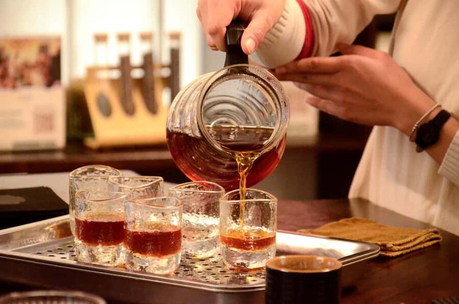 Hanoi: Taste Fresh Lotus Tea Ceremony & Untold Stories - Brewing the tea instead of only watching