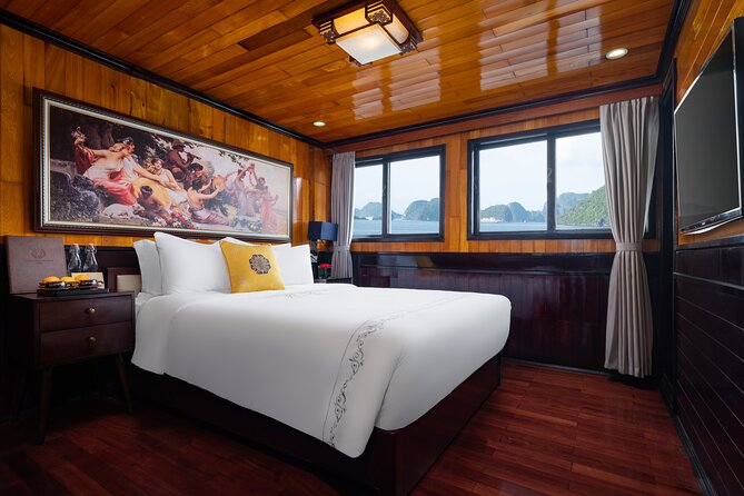HERA CLASSIC Boutique Cruise Halong Bay 2 Days 1 Night Trip - Sunset, cooking, and evening squid fishing