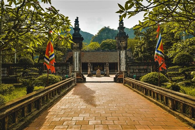 Hidden Ninh Binh Luxury Full Day Group Tour (Tam Coc - Hoa Lu) - Cycling through rice fields near Tam Coc