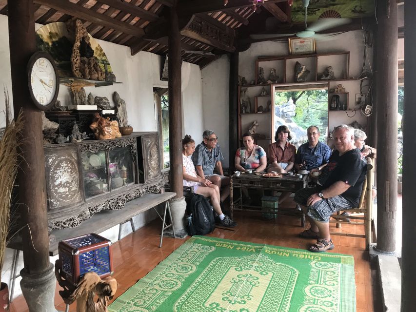 Hoa Lu, Mua Cave and Trang An Small-Group Boat Tour - Cycling through a Ninh Binh village
