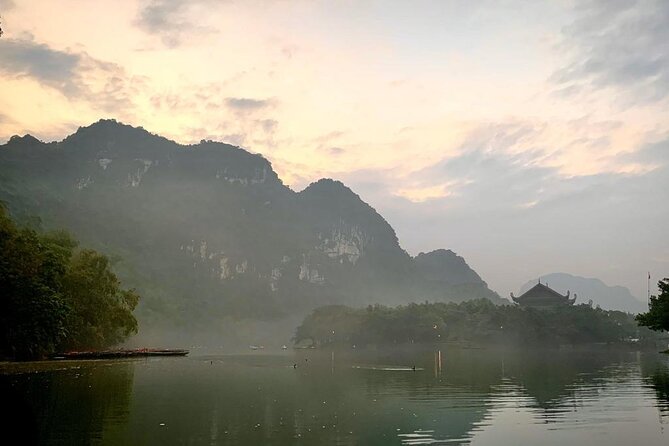Hoa Lu - Tam Coc - Mua Cave Full Day - LIMOUSINE - Tam Coc from the Ngo Dong River