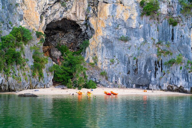 Lan Ha Bay Cruises 2 Days and 1 Night Caving, Kayaking, Swimming - Day one: Dark and Light Cave by bamboo boat