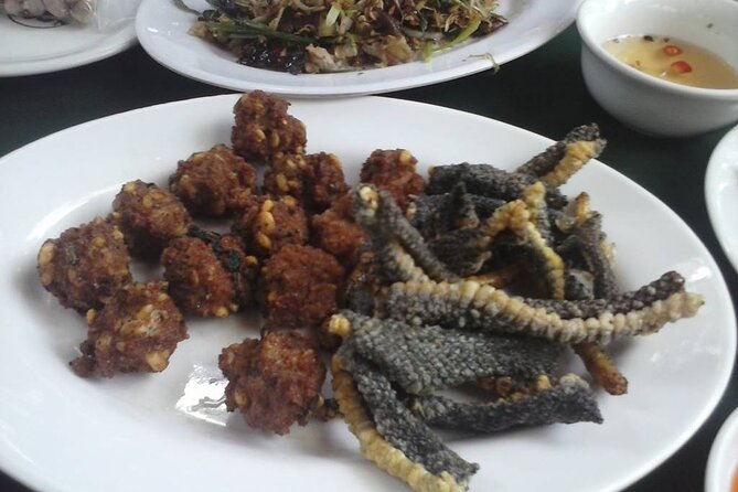 Le Mat Snake Village Tour With Snake Tasting - Sitting down to a seven to ten dish snake meal