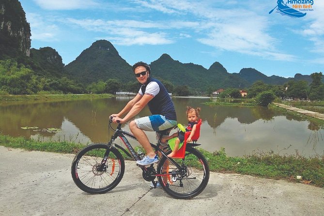 Mua Cave - Tam Coc - Bich Dong Day tour with transfer, local family & bike - Climbing Mua Cave for Ninh Binh’s Big View