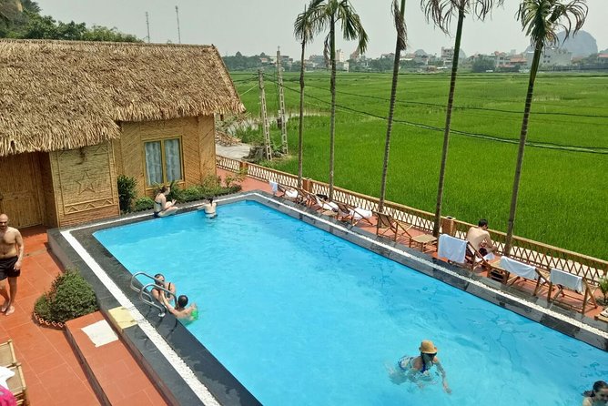 Ninh Binh Daily Tour: Hoa Lu -Mua Cave -Tam Coc- Bike-Swimming with Sunset Party - Lunch at a bungalow, with the menu set in advance