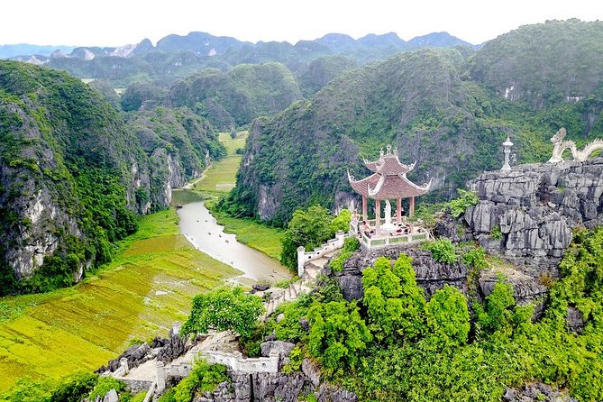 Ninh Binh Daily Tour: Hoa Lu -Mua Cave -Tam Coc- Bike-Swimming with Sunset Party - Cycling through rural Ninh Binh