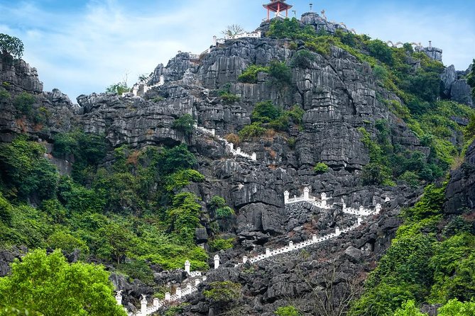 Ninh Binh Daily Tour: Hoa Lu -Mua Cave -Tam Coc- Bike-Swimming with Sunset Party - Swimming, fruit, and the sunset party