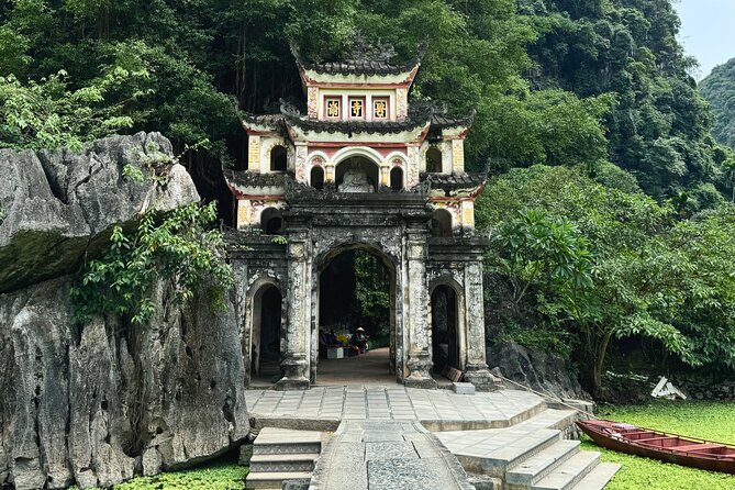 Ninh Binh Day Escape from Hanoi: Local Life, Connection & Tales - Tam Coc by sampan, with cliffs and cave passages