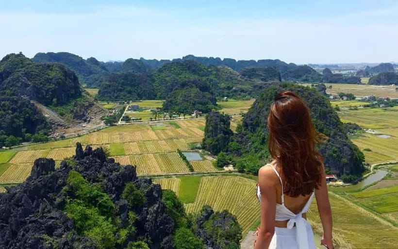 Ninh Binh Day Tour: Hoa Lu, Trang An Mua Cave, Boat Ride - Cycling through villages and rice fields
