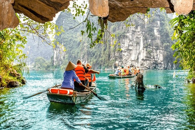Ninh Binh Day Tour Tam Coc Mua Cave Hoa Lu Buffet Lunch Limousine - Rowing through Tam Coc’s three grottoes