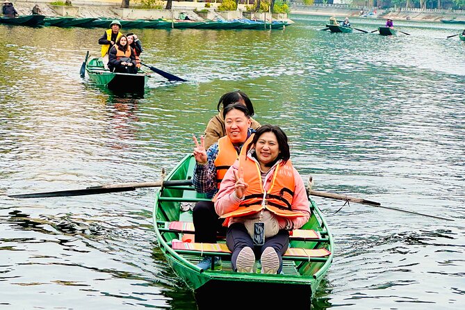 Ninh Binh Full Day to Hoa Lu, Tam Coc & Mua Cave Via Boat & Bike - Tam Coc by bamboo boat at about 1:00 p.m.