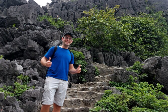Ninh Binh Full Day Tour Group 8 (Trang An- Bich Dong- Mua cave) - Climbing Mua Cave for the best view