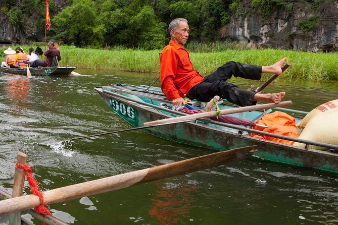 Ninh Binh Full Day Tour to Hoa Lu Tam Coc Mua Cave Buffet Lunch - Rowing through Tam Coc’s three grottos