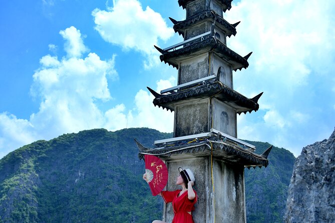 Ninh Binh Group Tour of 11 from Hanoi via Mua Cave Tam Coc Hoa Lu - Cycling past rice paddies and limestone peaks