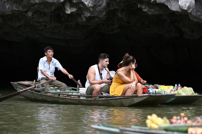 Ninh Binh luxury Day trip to Mua Cave, Tam Coc, Bich Dong, Boat & Bike - Cycling through villages toward Bich Dong Pagoda