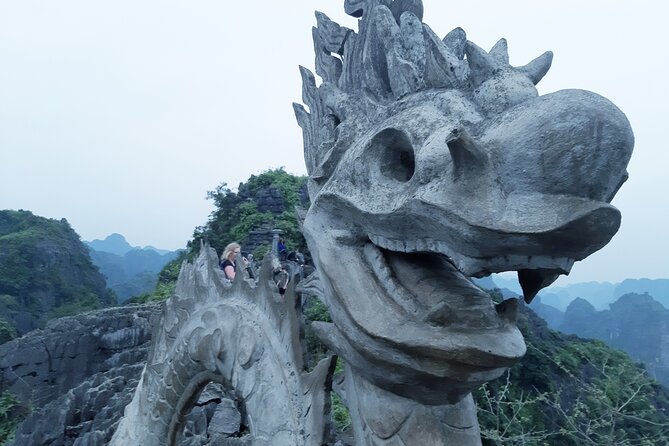 Ninh Binh luxury Day trip to Mua Cave, Tam Coc, Bich Dong, Boat & Bike - Tam Coc by sampan through three caves