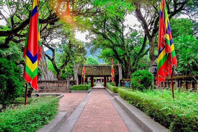 Ninh Binh Tour: Deluxe & Small Group Tam Coc Hoa Lu - Boat, Biking, Buffet Lunch - Tam Coc by wooden boat, through three flooded caves