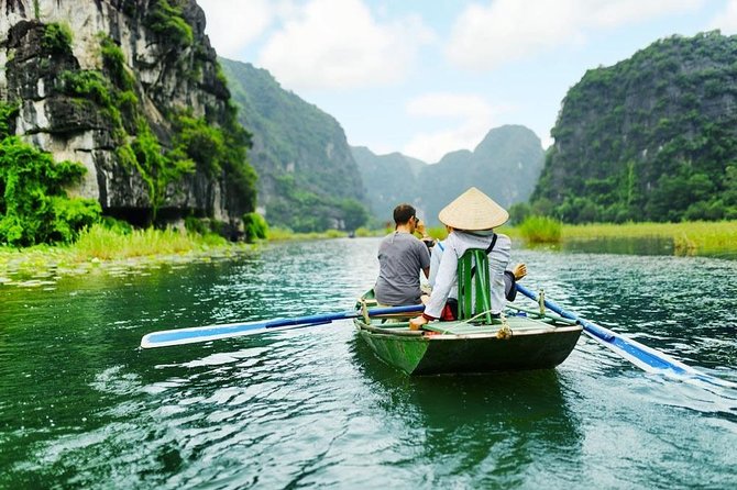 Ninh Binh Tour: Deluxe & Small Group Tam Coc Hoa Lu - Boat, Biking, Buffet Lunch - Cycling through villages and rice fields