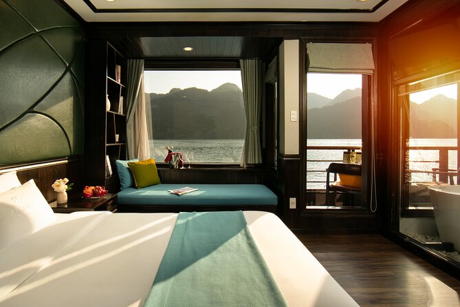 Peony Cruise 5</em> Lan Hạ Bay 2 days 1 night with 2 ways transfer – From Hanoi to the pier: an early start with a useful transfer’ /></p>
<p><p>Your day begins in Hanoi, not at the boat. A limousine bus is scheduled to collect you between 8:30 and 8:50 from a hotel in the Old Quarter or from 34 Hoa Ma in Hai Ba Trung. That timing matters because the cruise schedule begins around noon, leaving several hours for the road transfer and boarding process.</p>
</p>
<p><p>I like having the pickup included. Reaching the port on your own would add one more moving part to a trip that already involves Hanoi, Tuan Chau, Ha Long Bay, Lan Ha Bay, and Cat Ba Island. The air-conditioned vehicle also makes the first stretch more comfortable than a basic shared bus.</p>
</p>
<p><p>Still, do not treat the transfer wording casually. The supplied booking information says two-way transfer, while the practical details are clearer about pickup than drop-off. One booking required a phone call the day before to explain how both ends would work. I would confirm your hotel address, pickup point, and return arrangement before the morning of departure.</p>
</p>
<p><p>The start time shown in the booking information is listed as 12:00 am, but the detailed schedule gives the useful information: pickup at 8:30 to 8:50 and boarding around noon. Use the detailed schedule when planning your morning, and allow time to reach the vehicle before the stated pickup window.</p>
</p>
<div class="twil" style="margin: 20px 0; padding: 15px 0;"><p>More Lan Ha Bay cruises:</p><ul style="margin: 10px 0; padding-left: 0; list-style: none;"><li style="margin: 0 0 12px 0; padding: 0 0 12px 0; border-bottom: 1px solid #F4E1DF; line-height: 1.4;"><a href="https://lovinghanoi.com/amanda-cruise-ha-long-lan-ha-bay-all-inclusive-2d1n-3d2n/">Amanda Cruise – Ha Long, Lan Ha Bay – All Inclusive 2D1N & 3D2N</a><br><span style="font-size: 0.82em; color: #7A4A42;"><span style="color: #14CBC4;">★</span> 5.0 · 4,358 reviews</span></li><li style="margin: 0 0 12px 0; padding: 0 0 12px 0; border-bottom: 1px solid #F4E1DF; line-height: 1.4;"><a href="https://lovinghanoi.com/hanoi-2-day-halong-lan-ha-bay-5-star-cruise-with-balcony/">Hanoi: 2-Day Halong & Lan Ha Bay 5-Star Cruise with Balcony</a><br><span style="font-size: 0.82em; color: #7A4A42;"><span style="color: #14CBC4;">★</span> 4.8 · 3,300 reviews</span></li><li style="margin: 0; padding: 0; border-bottom: none; line-height: 1.4;"><a href="https://lovinghanoi.com/mon-cheri-cruise-5-star-unique-2-days-tuan-chau-halong-bay-lan-ha-bay/">Mon Chéri Cruise 5 star: Unique 2 Days Tuan Chau – Halong bay – Lan Ha Bay</a><br><span style="font-size: 0.82em; color: #7A4A42;"><span style="color: #14CBC4;">★</span> 5.0 · 2,422 reviews</span></li></ul></div><h2>Boarding at Tuan Chau and settling into the cruise</h2>
<p><img width="669" height="446" decoding="async" src=