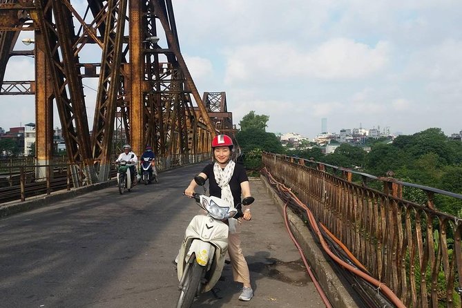 Private Hanoi Motorbike Sightseeing and Food Tour - Old City Gate and the railway street