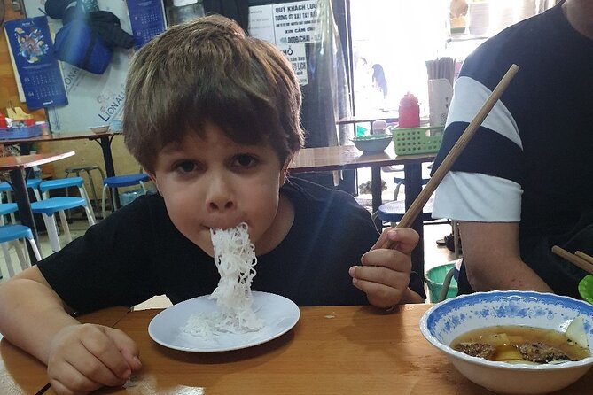 Private kid-friendly Hanoi food tour with a taste of great dishes - Hoan Kiem Lake and a useful change of pace