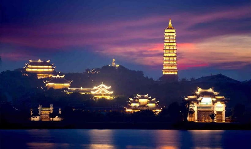 Sacred Nights at Bai Dinh Pagoda: A Spiritual Escape - Walking the Arhat Corridor under evening lights