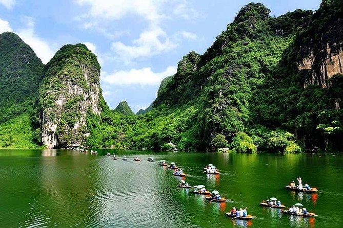 Trang An Complex - Hoa Lu - Mua cave Daily Group Tour - Rowing through the Trang An caves