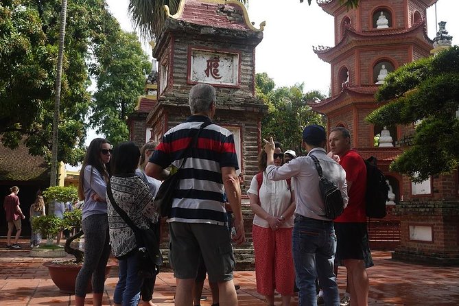 Unique Hanoi city tour full day - Small group tour - A quiet pause beside West Lake at Tran Quoc Pagoda
