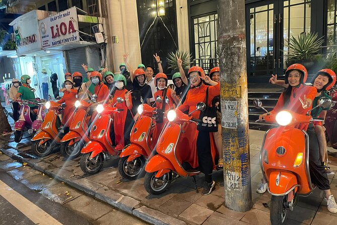 Vespa Female Ao Dai riders Night Street Food + See Train Street - Starting in the Old Quarter at 6 p.m.