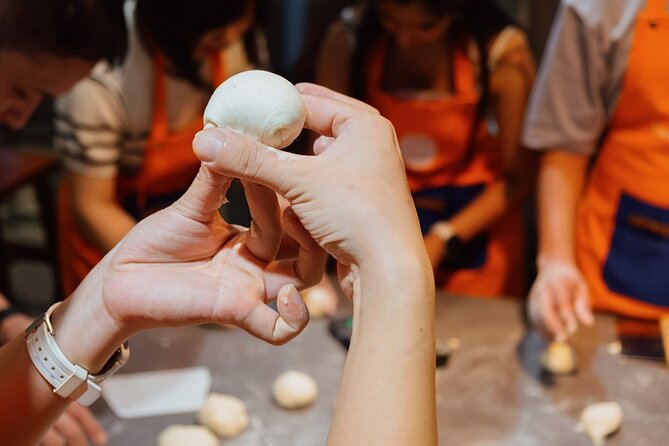 Vietnamese Bread & Brew: Banh Mi Baking Class & Specialty Coffee - Choosing meat or tofu and building the filling