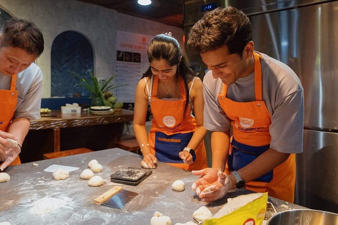 Vietnamese Bread & Brew: Banh Mi Baking Class & Specialty Coffee - Sitting down to eat your own work