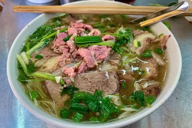 Walking Street Food Tour in Hanoi and Train Street - Walking through Hanoi’s Old Quarter